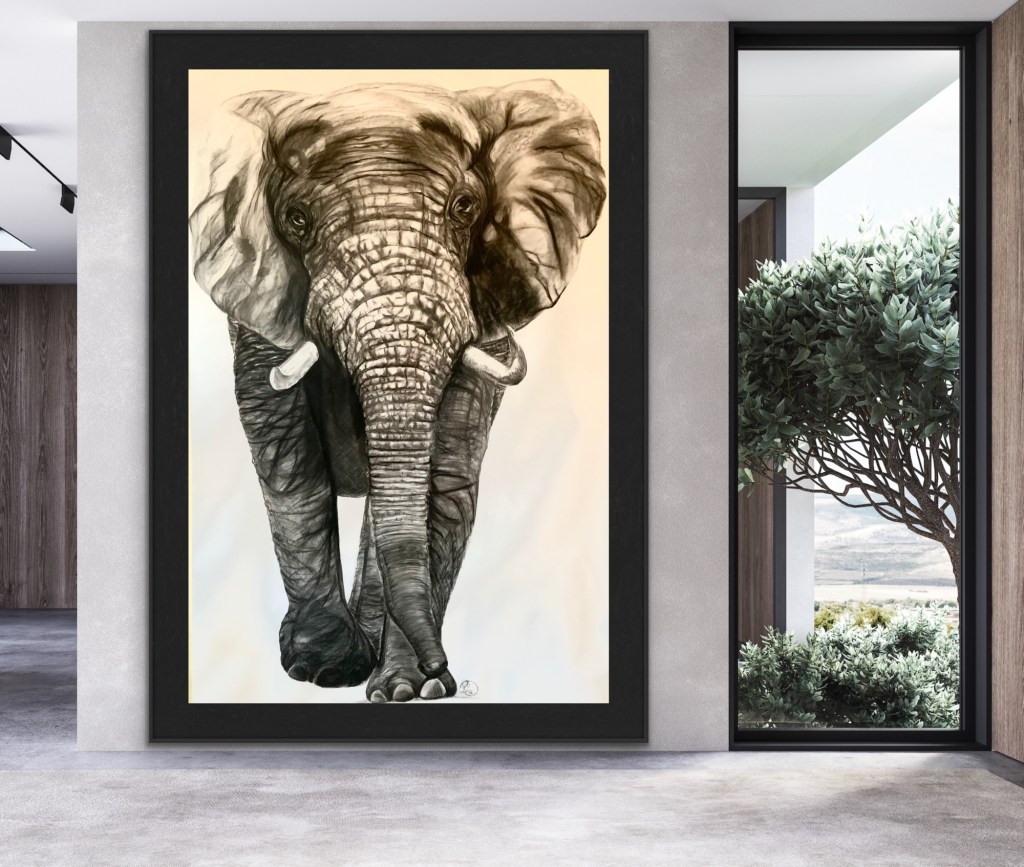 A framed artistic rendering of an elephant, displayed in a modern room with large windows and greenery visible outside.
